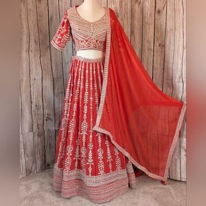 Vibrant Orange With White Embroidered Sequin Lehenga Choli